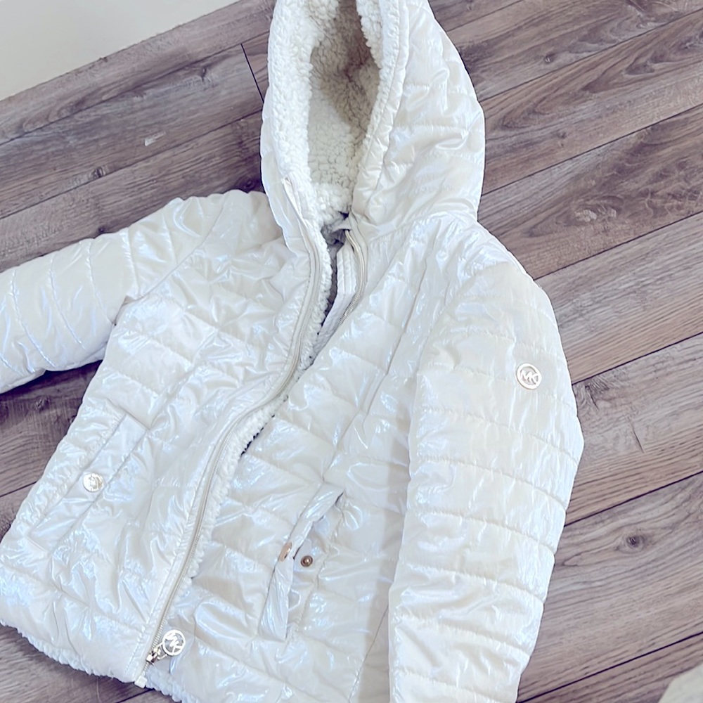 Michael Kors size 10/12 iridescent pearl puffer coat. Only worn 2 times.